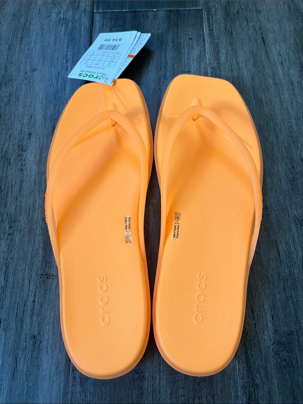 CROCS Women's Neon Orange Flip Flop Sandals